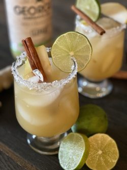 GEORGE’S® Spiced Pear Margaritas served with cinnamon stick and lime slice