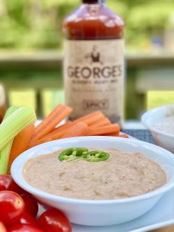 GEORGE’S® Bloody Mary Dip in a bowl served with tomatoes and celery