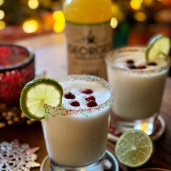 GEORGE’S® White Christmas Margarita served with cranberries for garnish