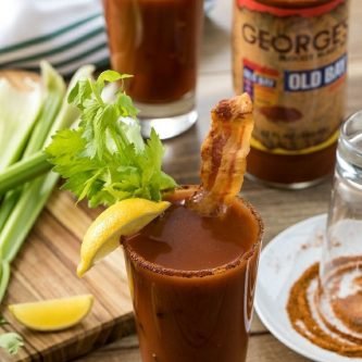 GEORGE’S® Bacon Infused OLD BAY® Bloody Mary served in salt rimmed glass
