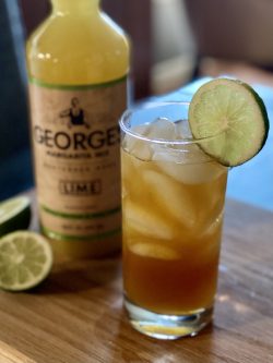 GEORGE’S® Harvest Dark and Stormy served with lime wedge garnish