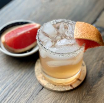 GEORGE’S® Paloma Cocktail served with grapefruit garnish