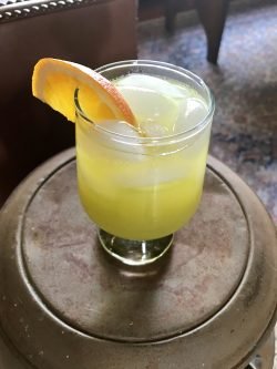 GEORGE’S® Irish Cocktail served with orange slice garnish