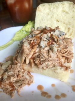 GEORGE’S® Slow Cooker ‘Buffalo’ Chicken Sandwich on a platee