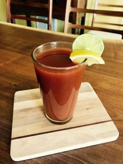GEORGE’S® Bloody Bull served in salt rimmed glass