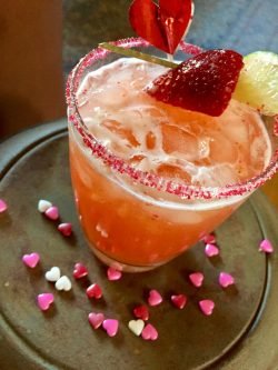 GEORGE’S® Valentine Rita served in pink sugar lined glass