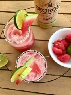2 GEORGE’S® Watermelon Margaritas served with lemon garnish