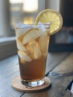 GEORGE’S® Long Island Ice Tea served with lemon slice garnish