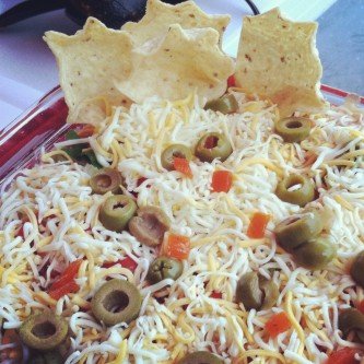 close up on bowl of GEORGE’S® Mexican Layer Dip