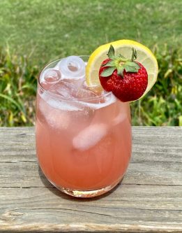 GEORGE’S® Strawberry Lemonade served with lemon slice and strawberry garnish