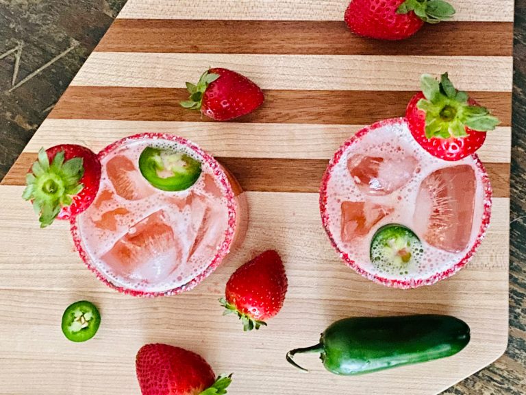 spicy strawberry margarita with jalapeños and strawberry margarita mix and tequila