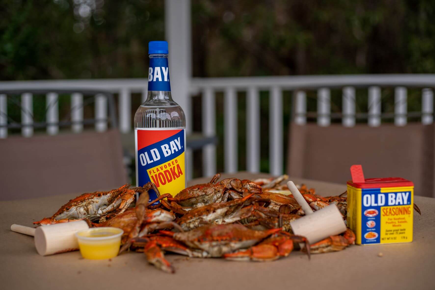 Old Bay Vodka surrounded by Maryland crabs