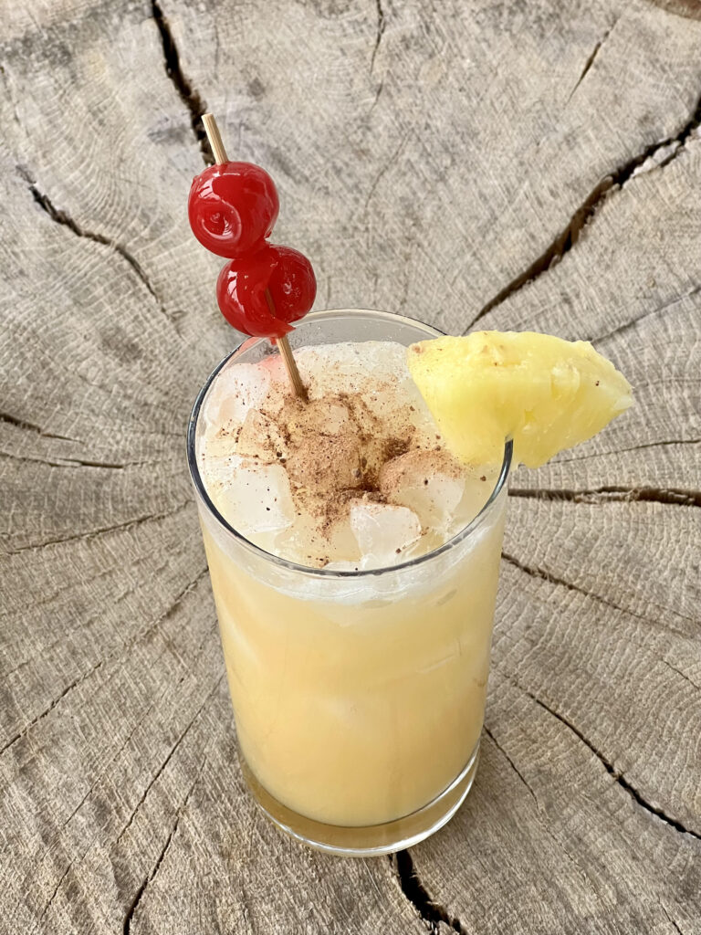 cocktail with cherries and pineapple