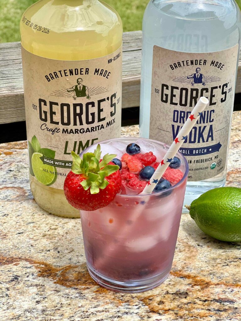 berry fizz cocktail with George's vodka and margarita bottles